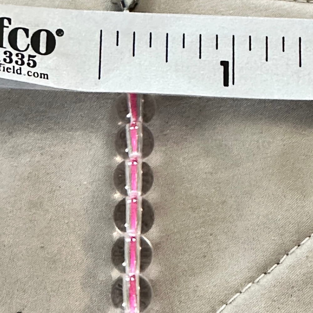 Graduating clear glass bead necklace strung on hot pink string. Lobster clasp - Picture 10 of 13